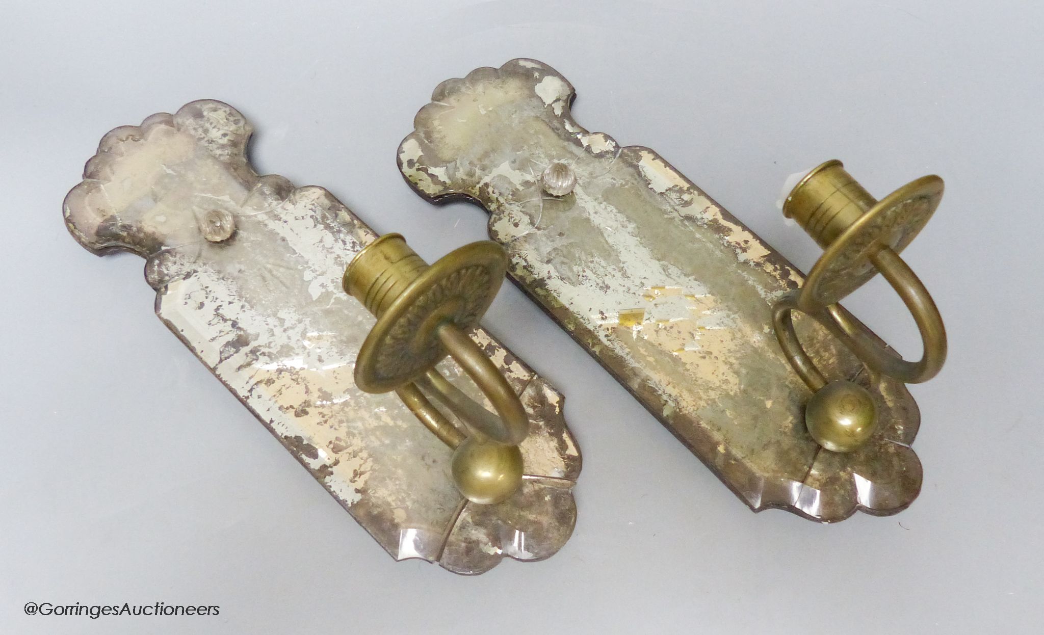 A pair of 18th century single sconce girandoles, with foiled back, length 31cm